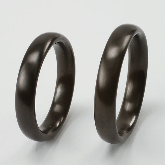 Zwarte ovalen ringen van zirkonium met afgerond profiel, 4 mm breed