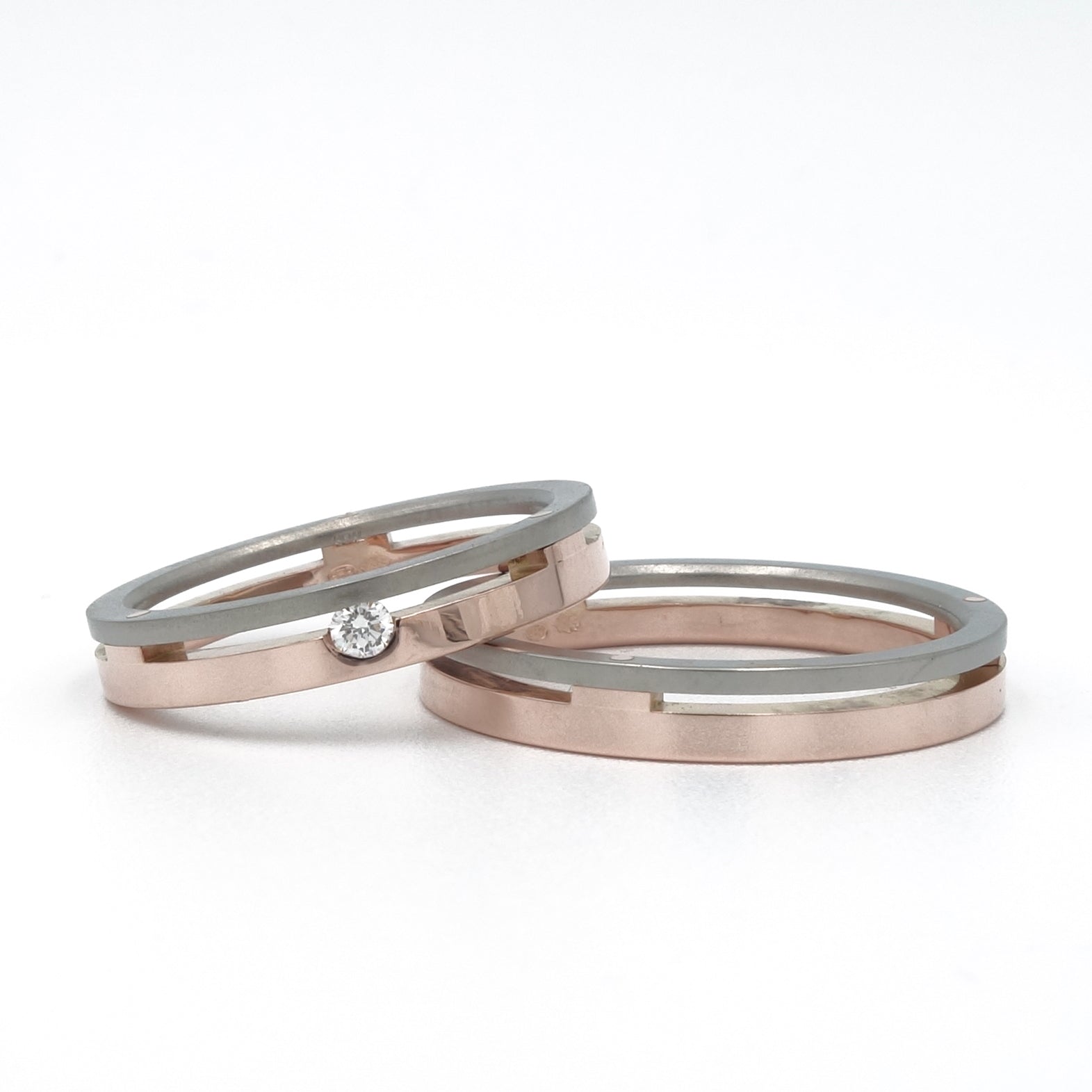 Palatto set van titanium en roodgoud met diamant in de damesring.