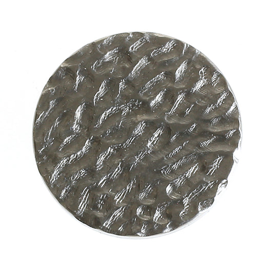 Titanium wisselhartje met organische structuur geïnspireerd op zandpatronen van het strand.