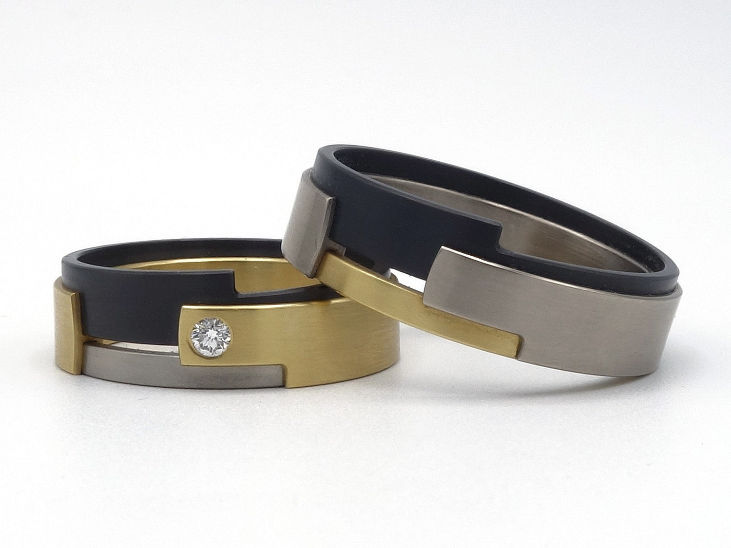 Set Aquila ringen contra titanium zirkonium goud damesring met diamant