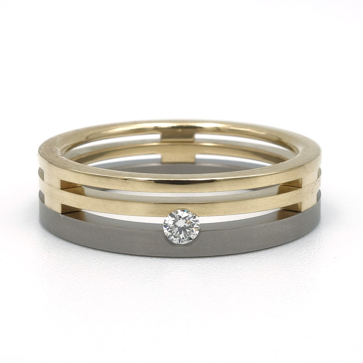 Titanium ring met dubbele band 18kr geelgoud en diamant 0,05 ct — Palatto Dubbel