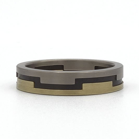 Smalle Kasteelring van titanium, zwart zirkonium en 14kr geelgoud met kartelprofiel