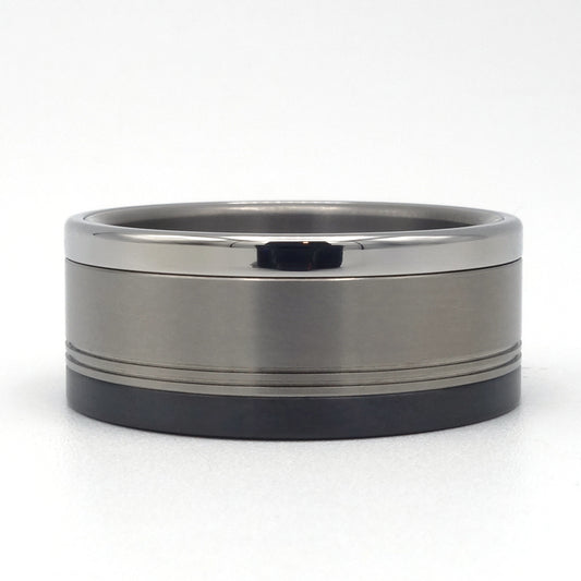 Prado ring met titanium middendeel, zirkonium zijring en edelstalen zijring.