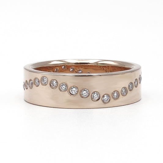 18 karaat roodgouden Nauta Alliance ring met diamanten in een golvende lijn rondom.